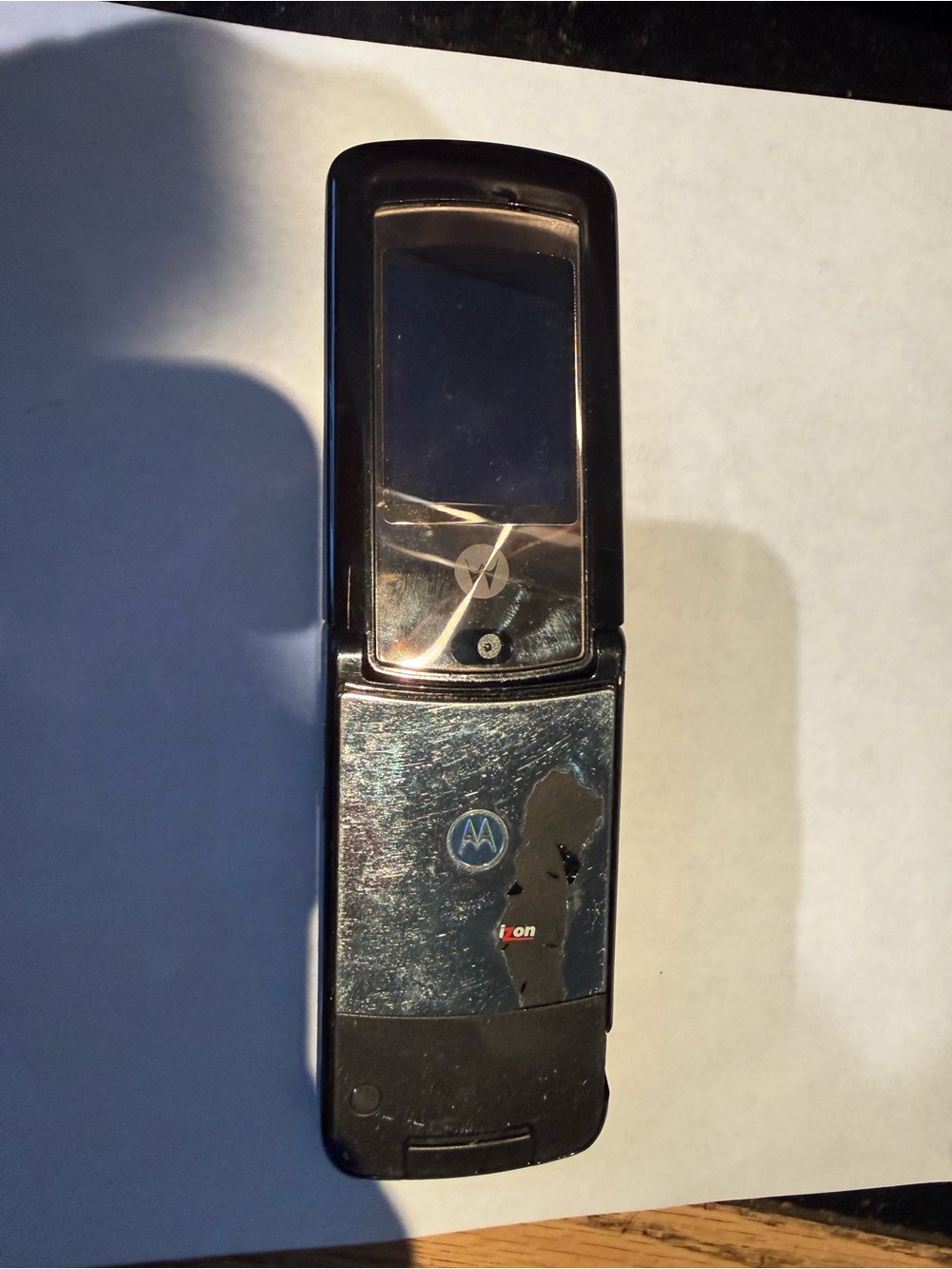 Motorola Black Flip Phone with Silver Faceplate